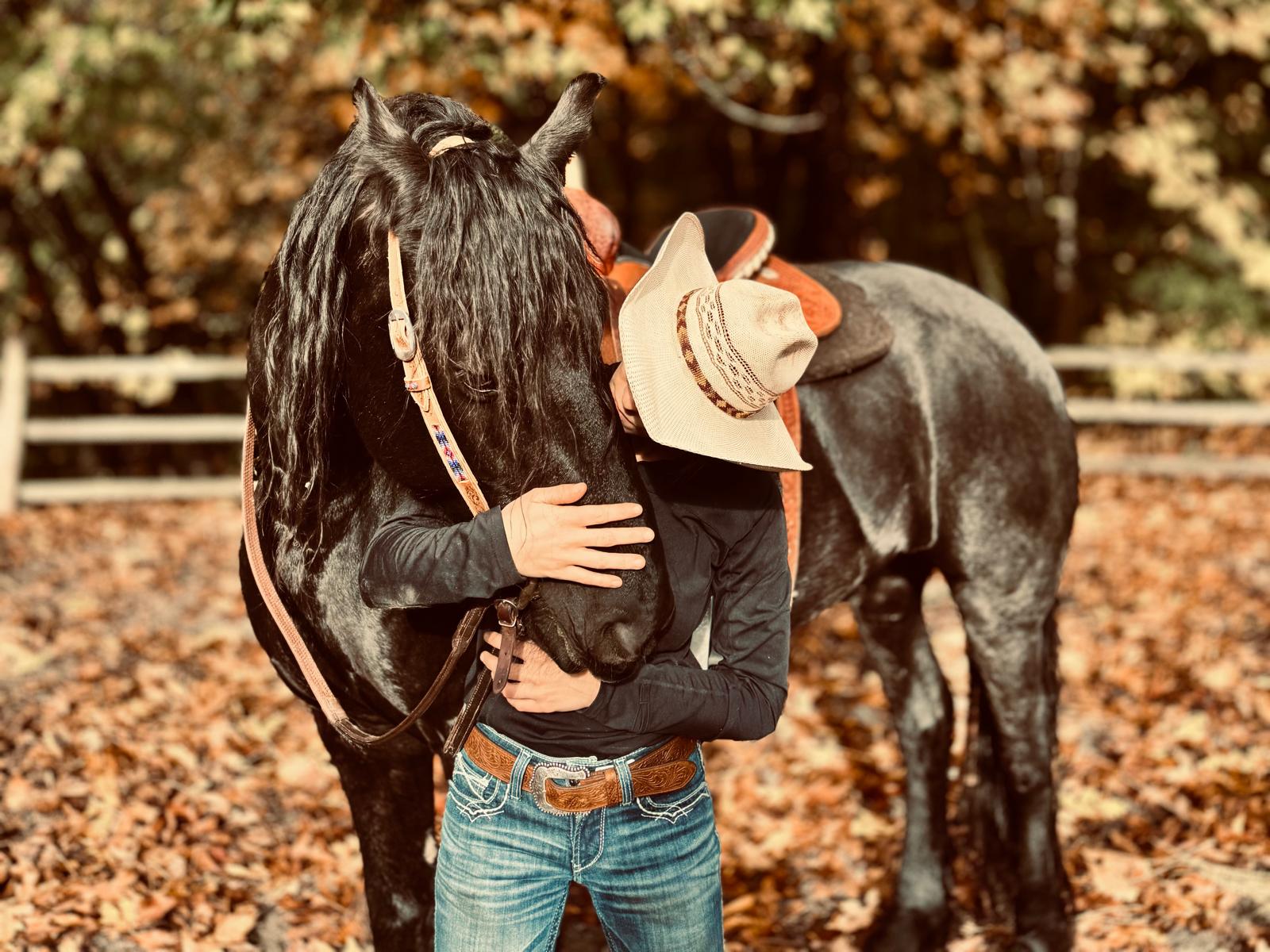 Sharing a quiet moment with a horse in autumn